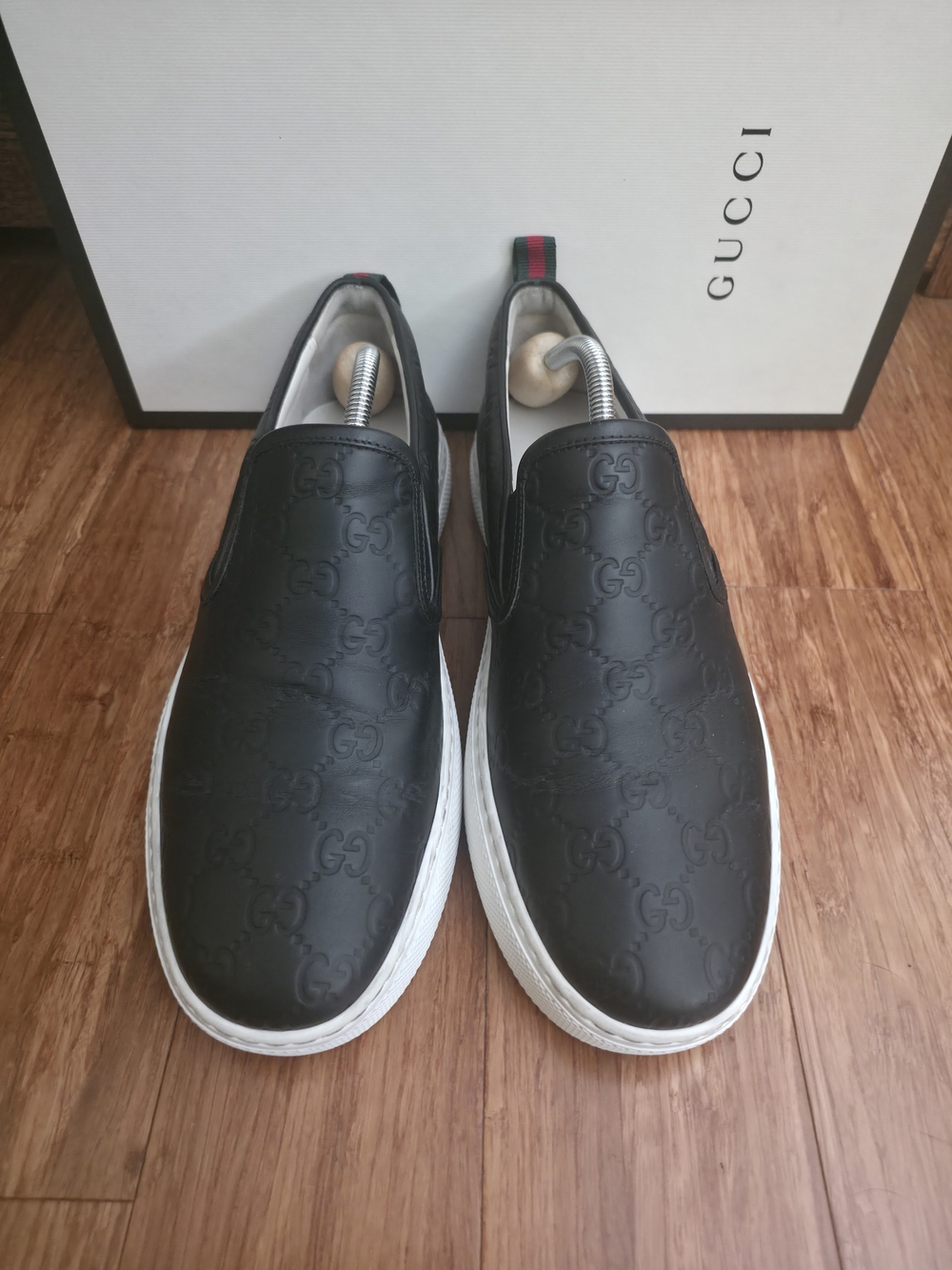 Gucci Guccissima Men’s Black Embossed Slip-On Sneakers.